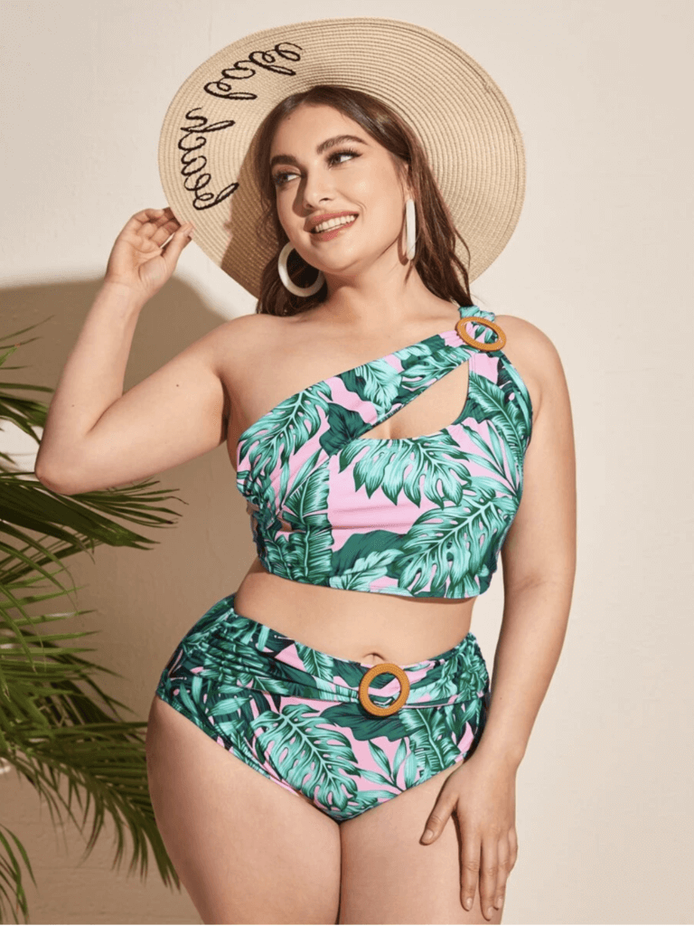 Curvy Shein model wearing pink and green tropic two piece
